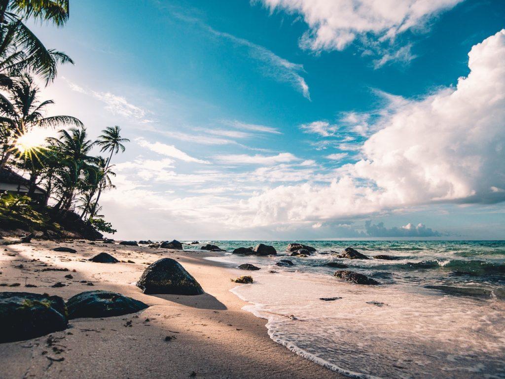 Sandy beach near rocks