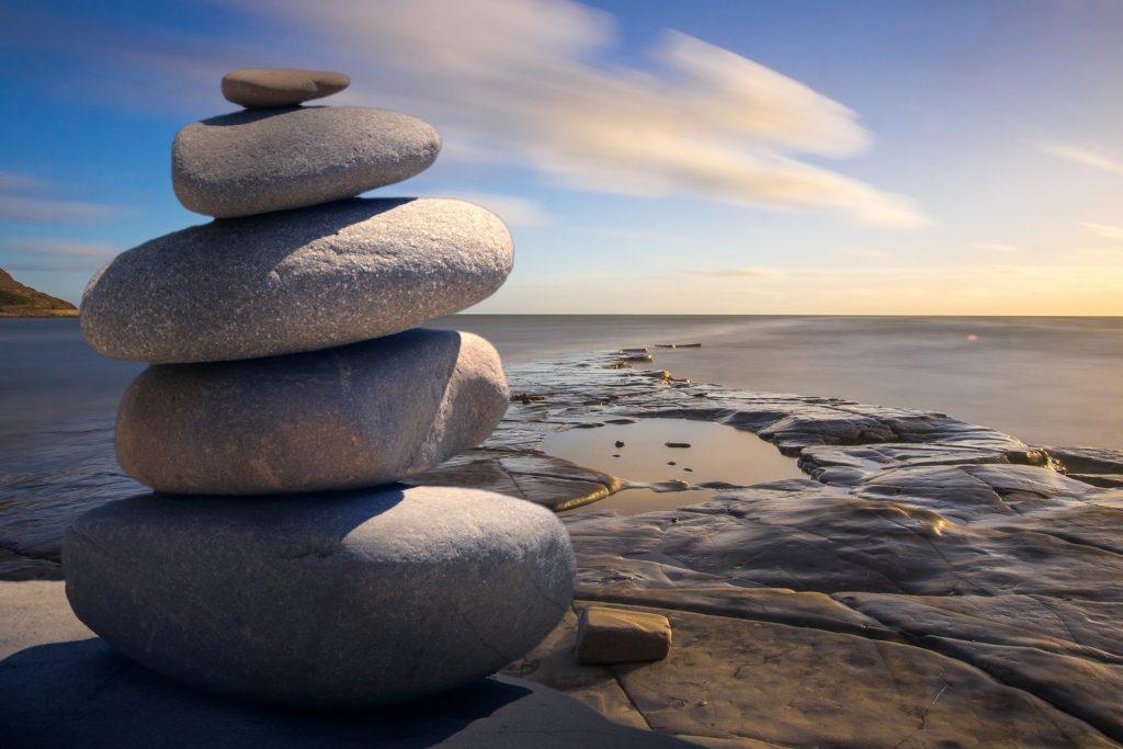 Stones stacked purposefully to symbolise eudaimonic well-being